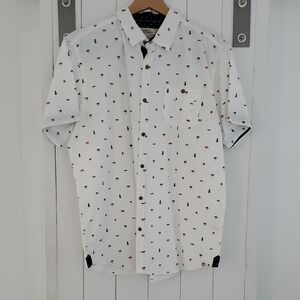 Free Planet White Shirt with Black and Red Accents